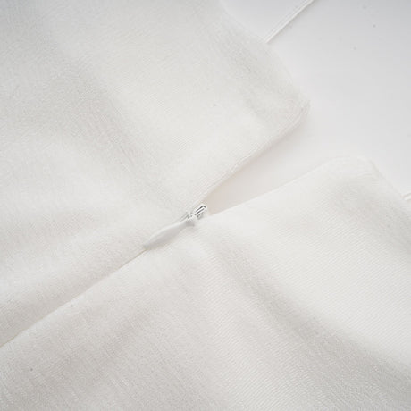 Selmori Noémie off-shoulder panelled maxi dress in White