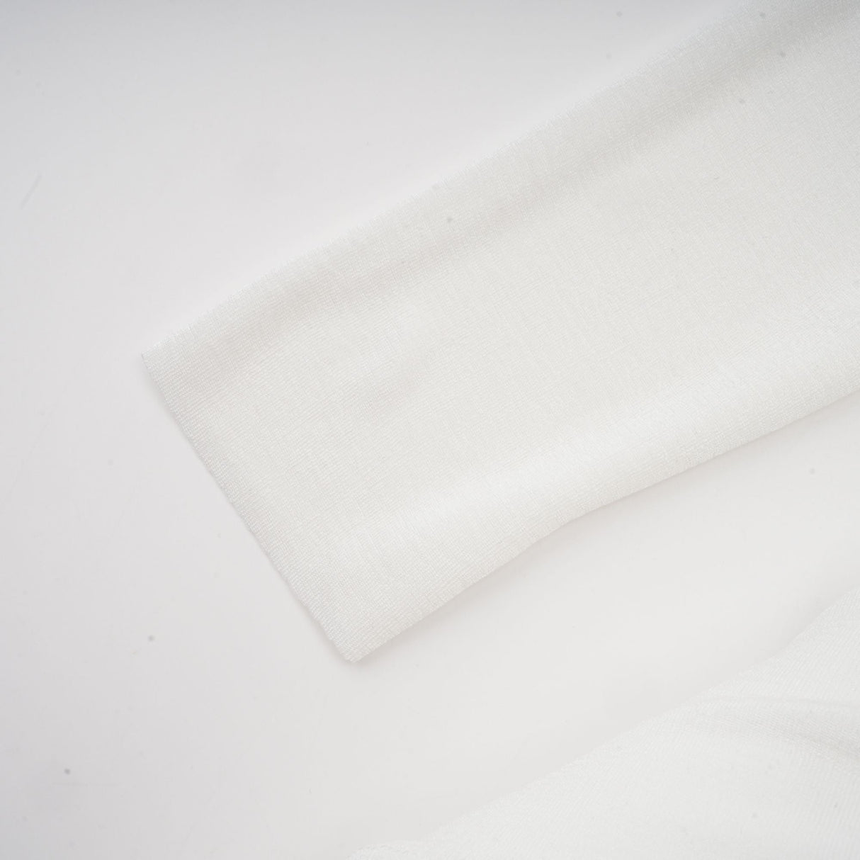 Selmori Noémie off-shoulder panelled maxi dress in White