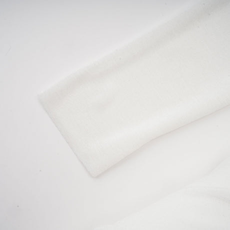 Selmori Noémie off-shoulder panelled maxi dress in White