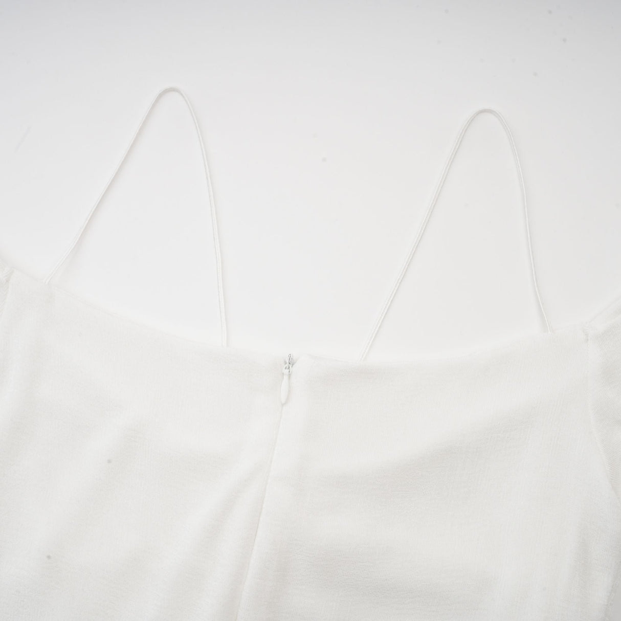 Selmori Noémie off-shoulder panelled maxi dress in White
