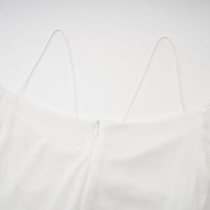 Selmori Noémie off-shoulder panelled maxi dress in White