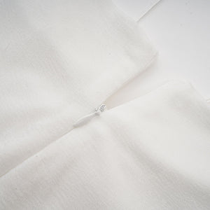 Selmori Noémie off-shoulder panelled maxi dress in White