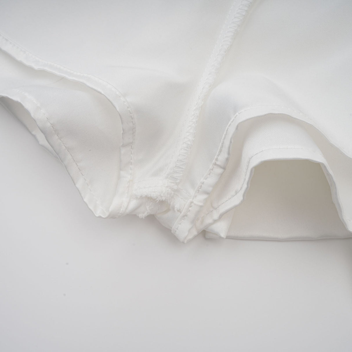 Selmori Aurélie white halterneck ruffled mini dress