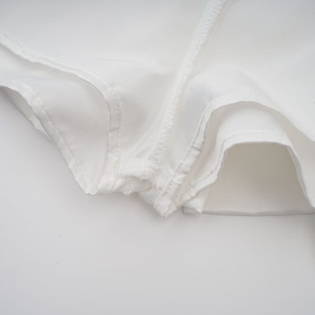 Selmori Aurélie white halterneck ruffled mini dress